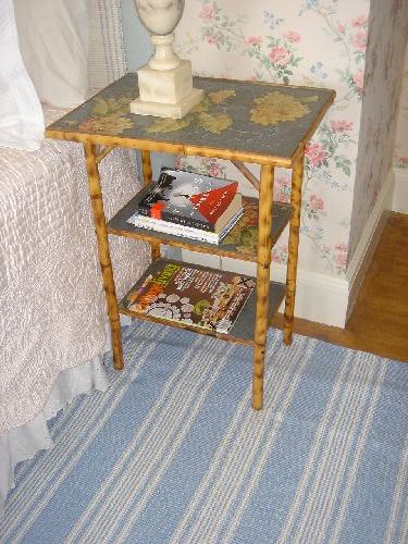 bamboo table with shelves and decoupage decoration