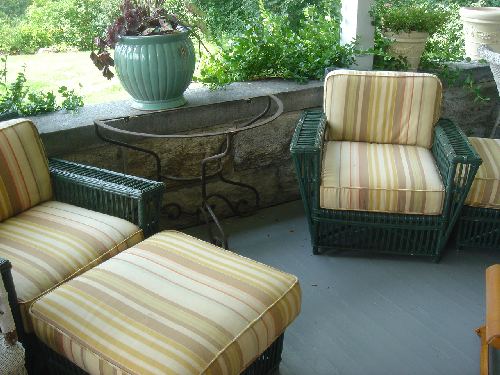 pair of Maine Cottage armchairs and ottomons