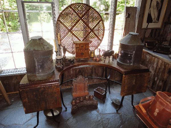 half round buffet table with iron base, port and starboard ship lights